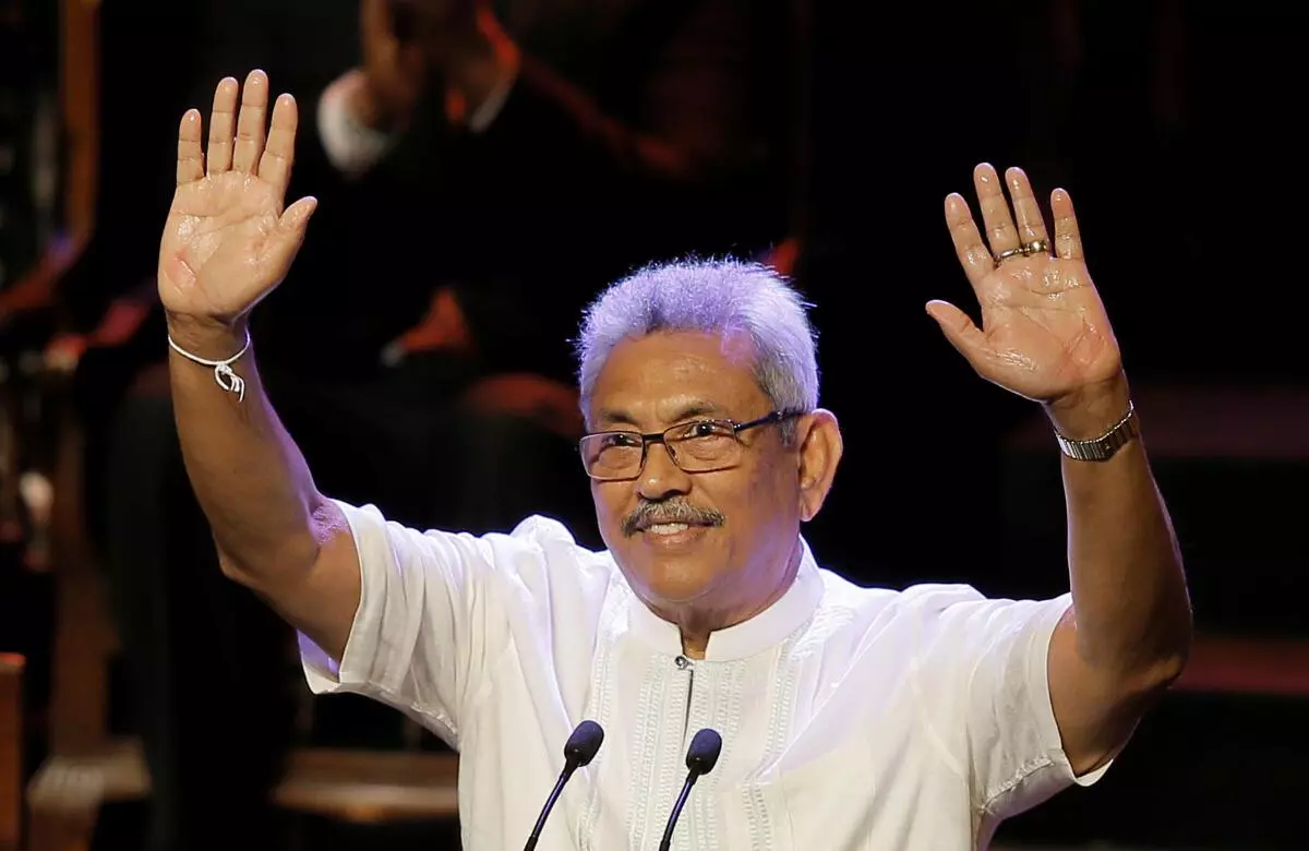 Gotabaya Rajapaksa waves at the party members during the launching ceremony of his election manifesto in Colombo, Sri Lanka, October 25, 2019. REUTERS/File photo