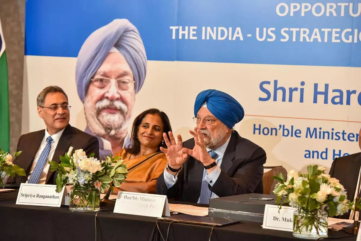 Union Minister Hardeep Singh Puri with the US energy industry delegates during executive round table organised by US-India strategic partnership forum in Houston. (PTI)