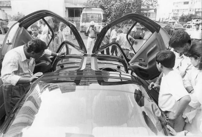 File photo of buyers examining the Toyota Sierra that belonged to Harshad Mehta at his residence in Bombay. A total of 18 cars, including six Toyotas and two Hondas, were auctioned by the Special Court. (Source: The Hindu Archives) File photo of buyers examining the Toyota Sierra that belonged to Harshad Mehta at his residence in Bombay. A total of 18 cars, including six Toyotas and two Hondas, were auctioned by the Special Court. (Source: The Hindu Archives)