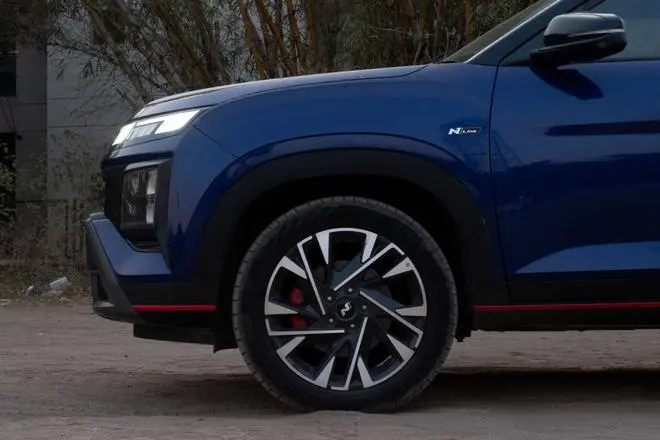 Quietly bold: The Creta N Line is full of subtler details — bold red accents, a diffuser-like rear bumper, a discreet N Line badge, red brake callipers, and swanky wheels — that set it apart