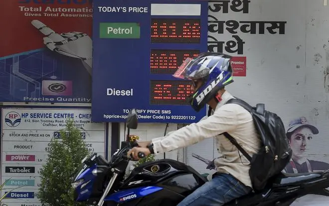 For the government, which has been is fighting hard to contain the inflation, passing on fuel prices to customers would have risked the inflation numbers even further (file picture) For the government, which has been is fighting hard to contain the inflation, passing on fuel prices to customers would have risked the inflation numbers even further (file picture)