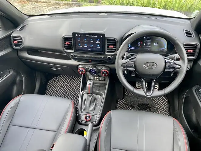 Apart from the multiple controls for the infotainment system, it also has large paddles for manual gear selection Apart from the multiple controls for the infotainment system, it also has large paddles for manual gear selection