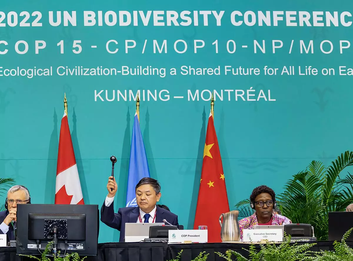 Chinese Environment Minister Huang Runqiu and COP15 President Huang Runqiu at the UN COP15, in Montreal, Monday, December 19, 2022. (PTI Photo)
