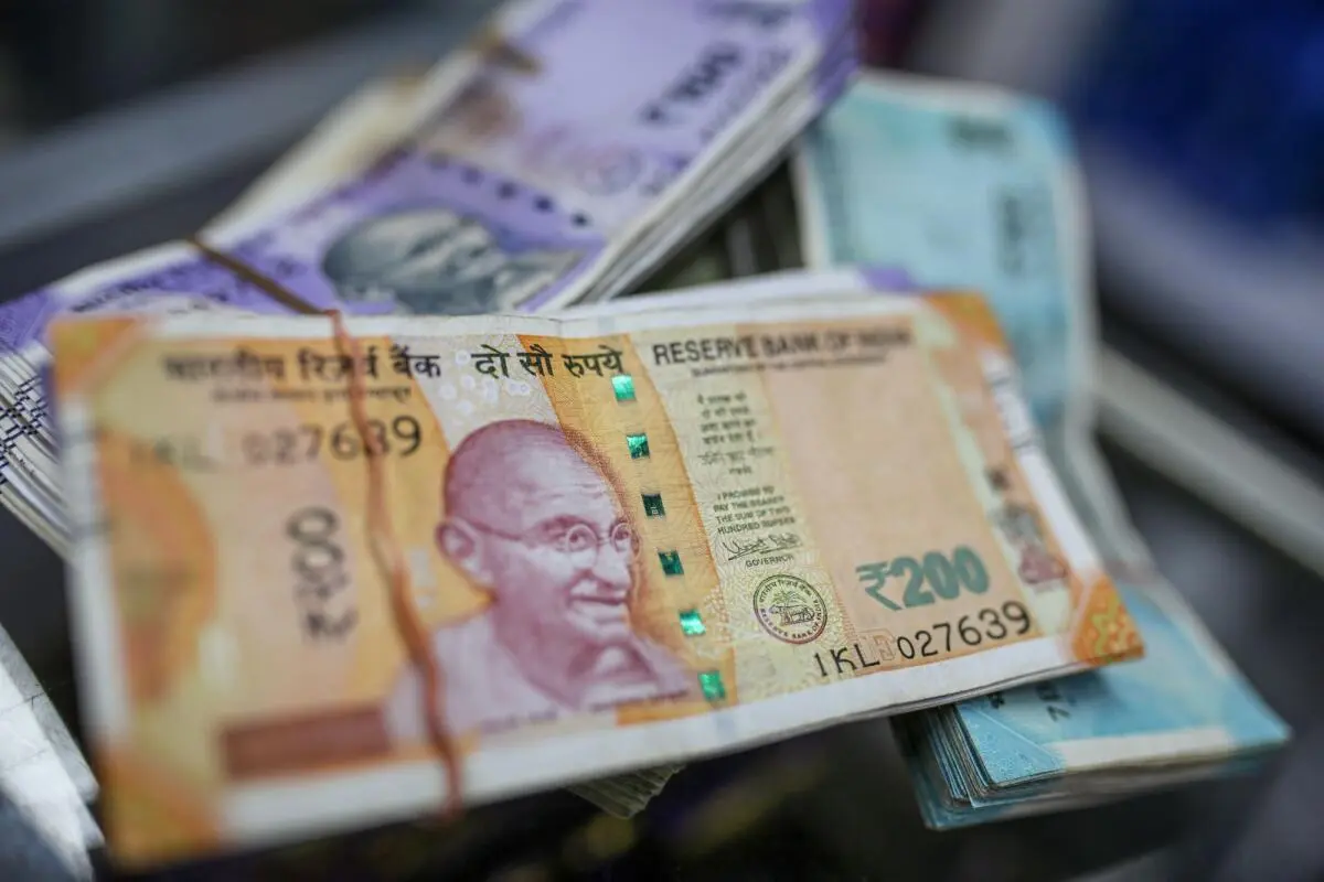 Rupee falls 14 paise to 82.35 against US dollar in early trade - The Hindu  BusinessLine