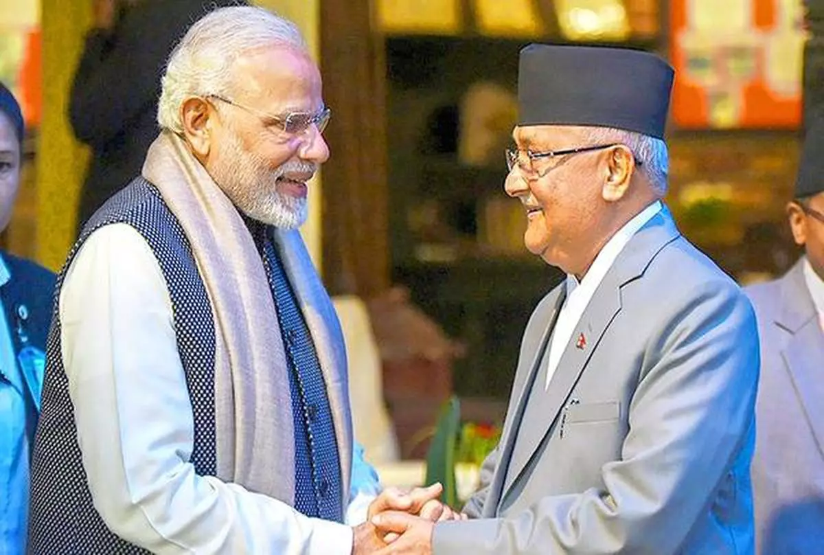   Prime Minister Narendra Modi with   his Nepalese counterpart  KP Sharma Oli (file photo)
