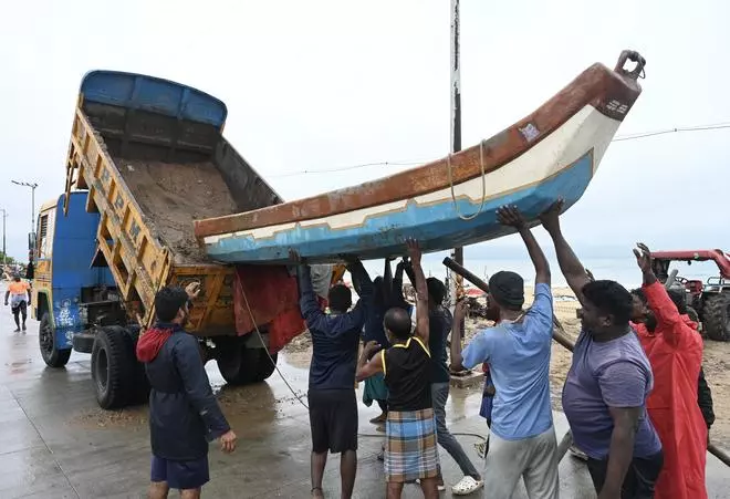 Boats being moved to low lying areas for rescue operations in Chennai.