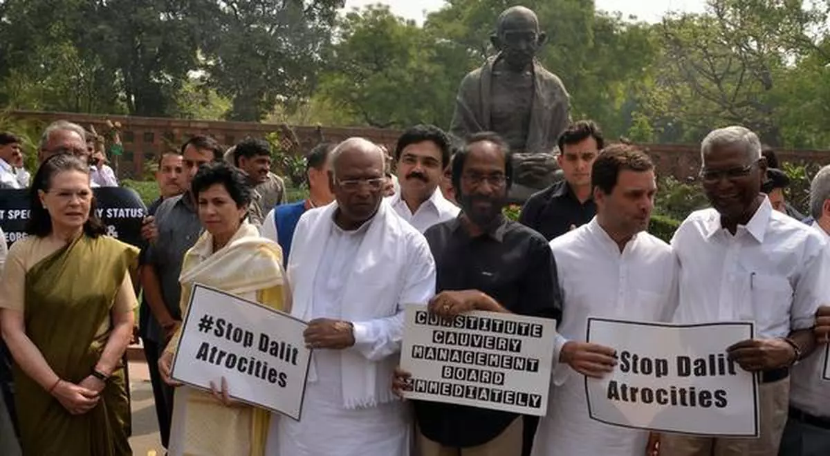 Sonia Gandhi and Congress president Rahul Gandhi,  along with Opposition  MPs, stage a protest  at the Parliament House, in New Delhi on Thursday