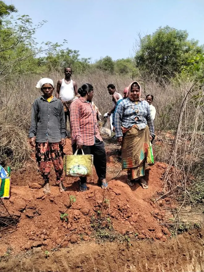 Workers at Yana Cheruvu, off Vadlakonda village, Janagaon district, Telangana