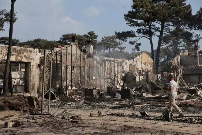 A view shows debris at a camping site of Dune du Pilat destroyed by a major fire near La Teste-de-Buch forest as wildfires continue to spread in the Gironde region of southwestern France, July 19, 2022. REUTERS A view shows debris at a camping site of Dune du Pilat destroyed by a major fire near La Teste-de-Buch forest as wildfires continue to spread in the Gironde region of southwestern France, July 19, 2022. REUTERS