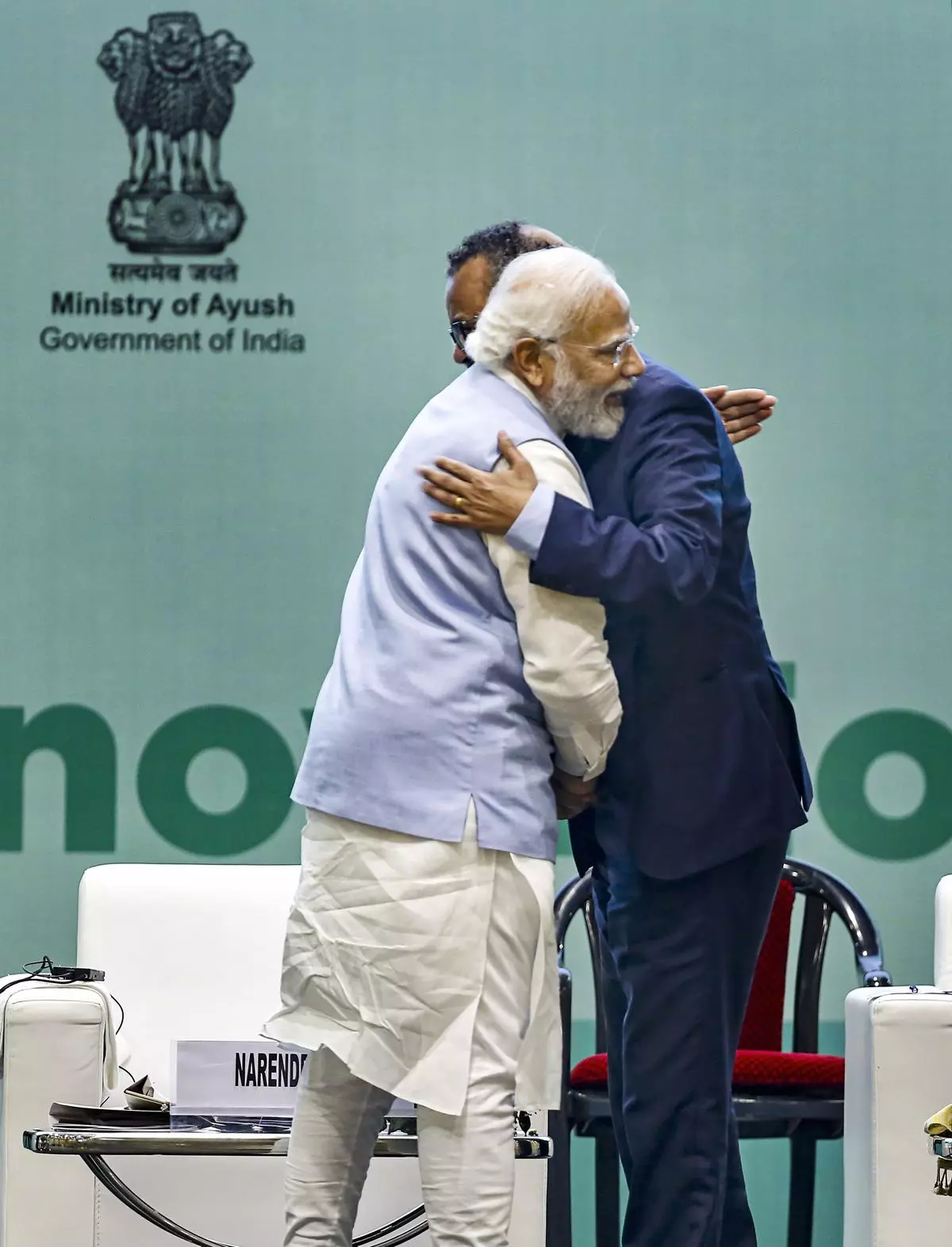 Prime Minister Narendra Modi and World Health Organization Director General Tedros Adhanom Ghebreyesus greet each other at the Global Ayush Investment and Innovation Summit 2022 (GAIIS) in Gandhinagar. -PTI Photo
