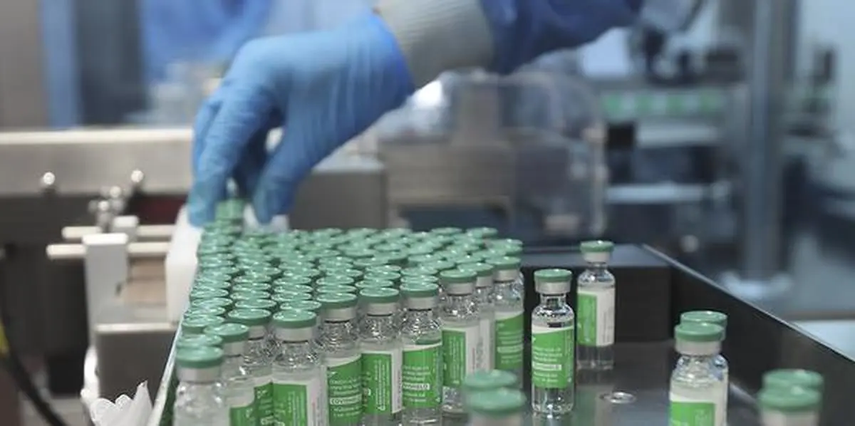 An employee works inside a laboratory at the Serum Institute of India, in Pune, India, Thursday, Jan. 21, 2021. The world's largest vaccine maker will be able to restart exports of AstraZeneca doses by June if new coronavirus infections subside in the country, its chief executive said Tuesday, April 6. But a continued surge could result in more delays because the Serum Institute of India would have to meet domestic needs, Adar Poonawalla warned in an interview with The Associated Press. (AP Photo/Rafiq Maqbool)