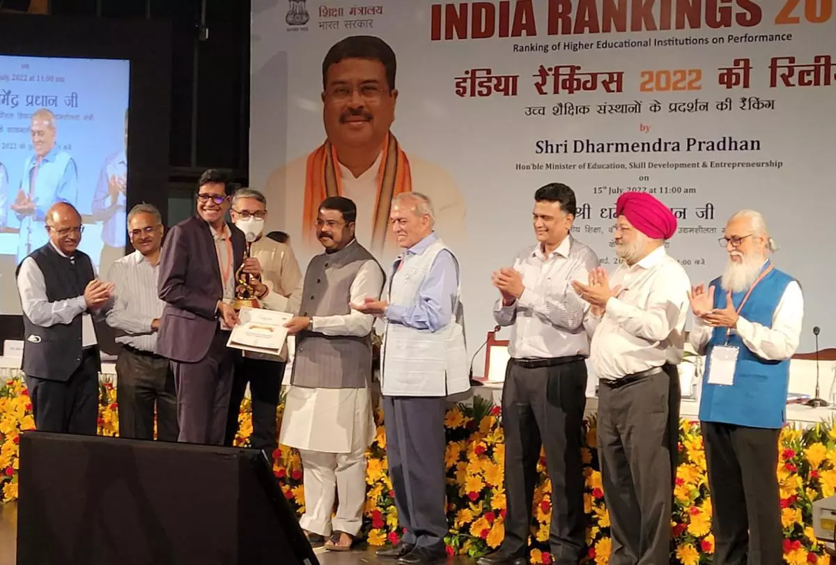 V Kamakoti (third from left), Director, IIT Madras, receiving the prize for NIRF 2022 Ranking from Education Minister Dharmendra Pradhan (fifth from right) in New Delhi on Friday
