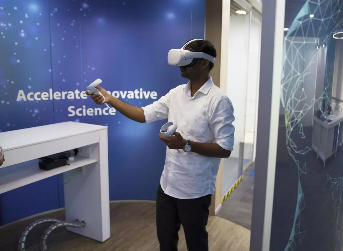 An XR developer of AstraZeneca’s Global Innovation and Technology Centre is seen working on building Virtual Reality based experiences for Oculus devices