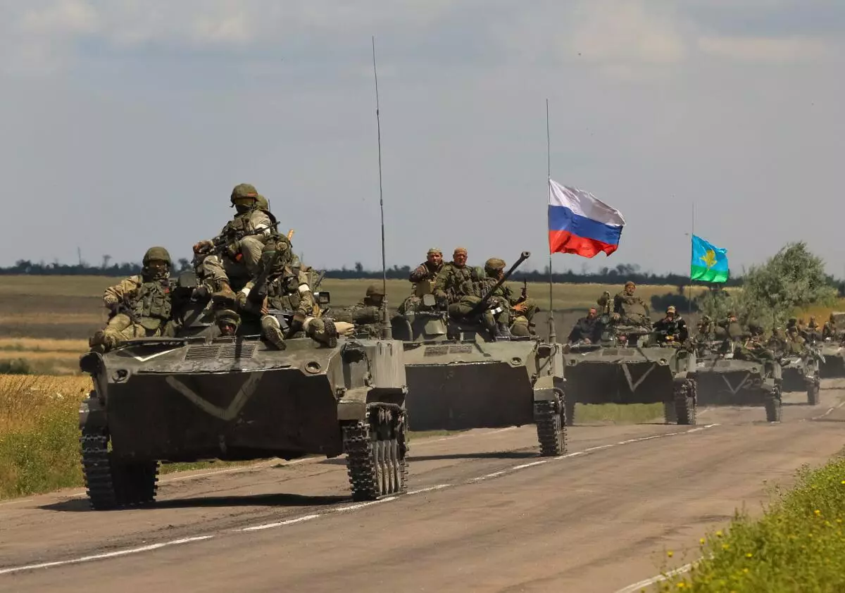 An armoured convoy of Russian troops drives in Russian-held part of Zaporizhzhia region, Ukraine, July 23, 2022. REUTERS