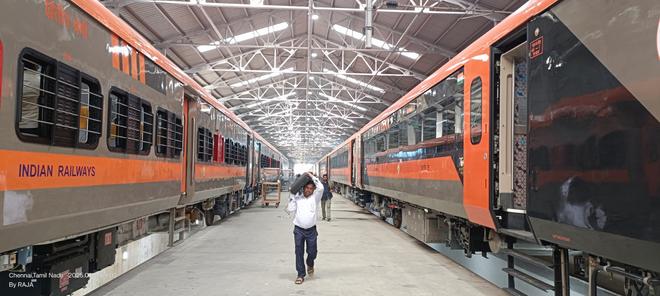 Amrit Bharat and Vande Bharat sleeper train parked side-by-side at the ICF.