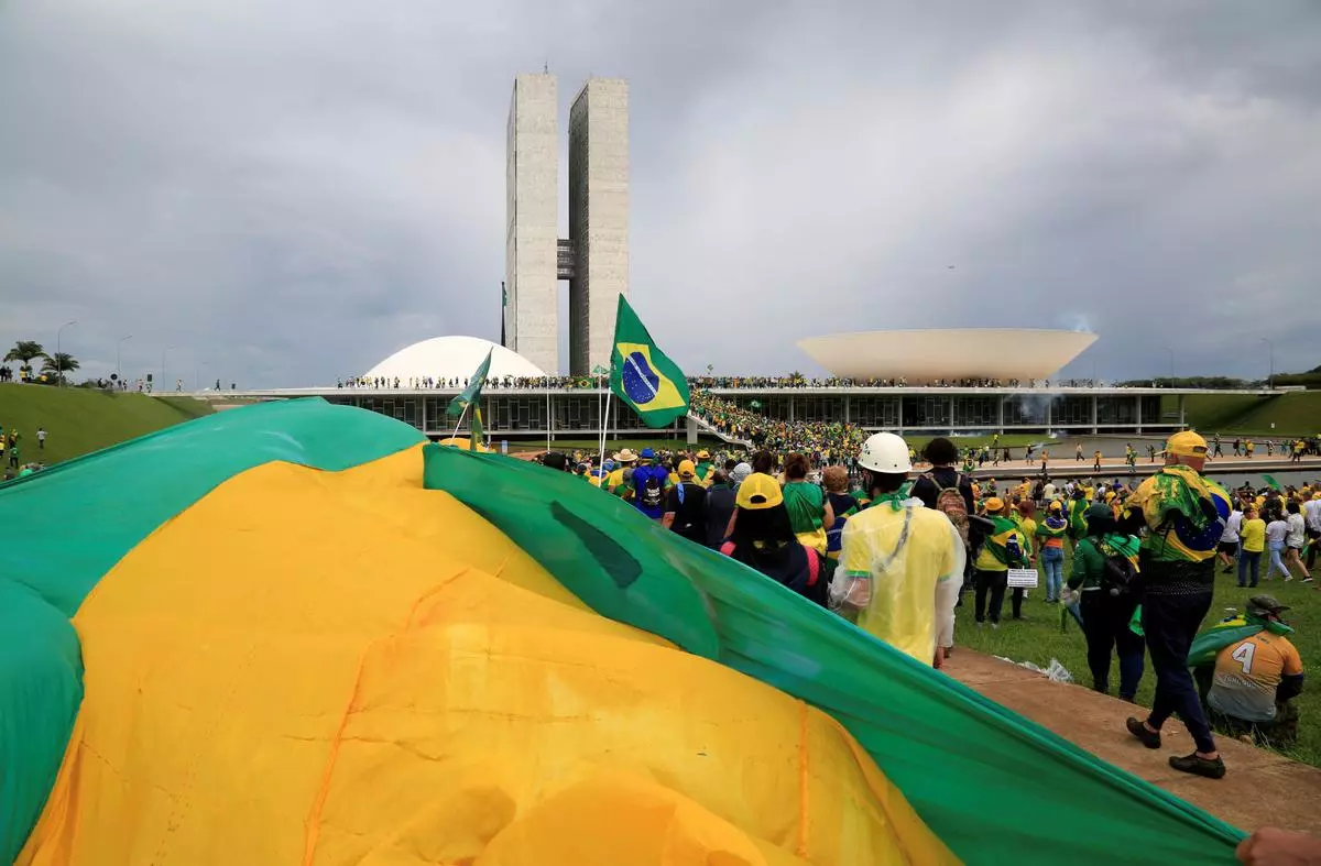 Supporters of Brazilian former President Jair Bolsonaro invade the National Congress in Brasilia on January 8, 2023