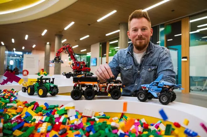 Lego designer Samuel Tacchi from France, 34, shows a few designs at the Lego campus in Billund, Denmark 