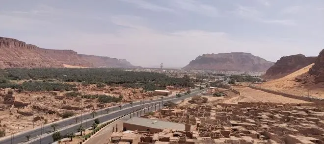 The green palm grove and the ‘old town’ as seen from Harrat view point The green palm grove and the ‘old town’ as seen from Harrat view point