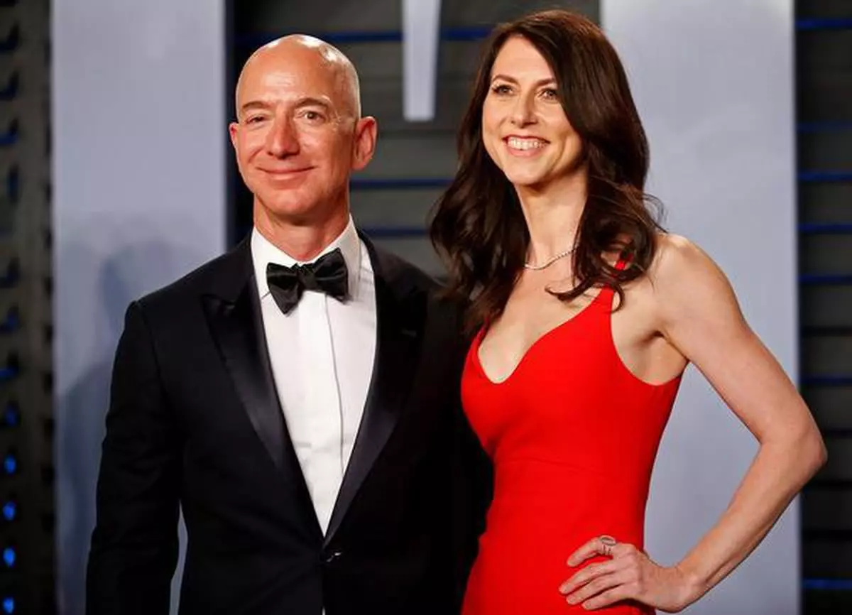 A file photo of Amazon CEO Jeff Bezos and wife MacKenzie Bezos
