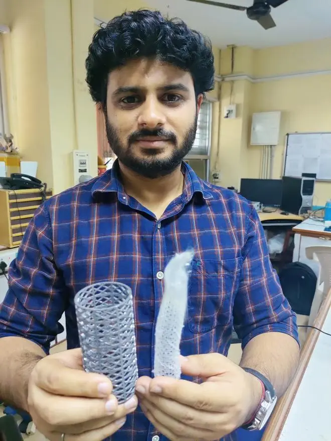 Deepak Sharma holding a ‘Venus flower basket’ and a functional material Deepak Sharma holding a ‘Venus flower basket’ and a functional material