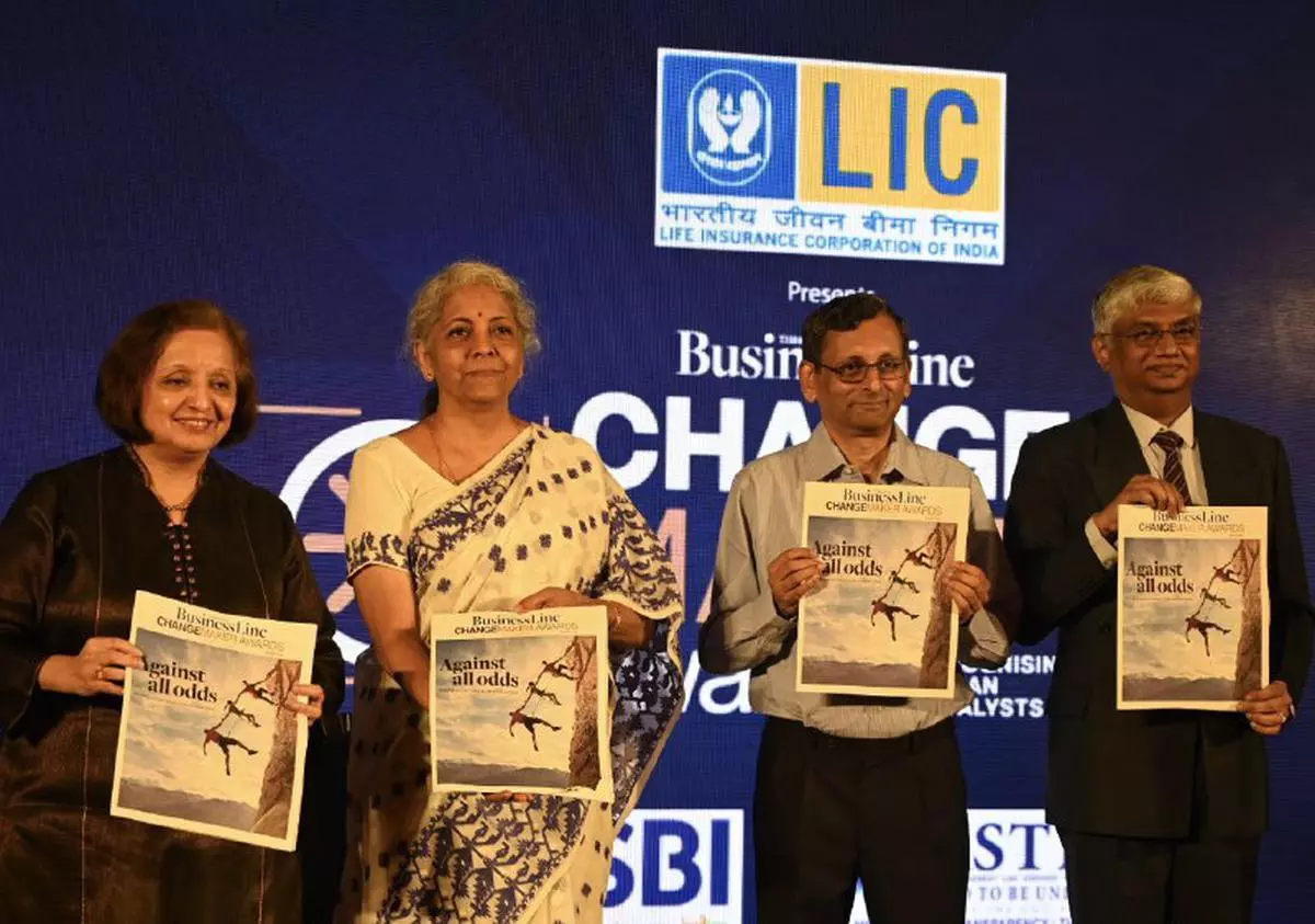 Finance Minister Nirmala Sitharaman releasing a tabloid with K Venugopal, Founder of BusinessLine (second from right); Raghuvir Srinivasan, Editor, BusinessLine; and Malini Parthasarathy, Chairperson, THG Ltd, in New Delhi on Friday