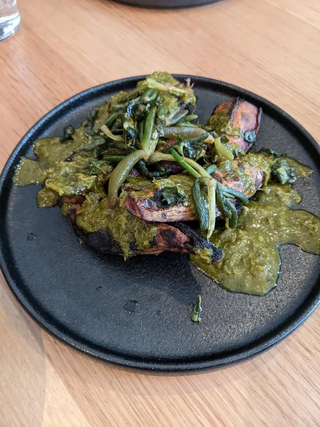 Rock baked yam, sea parsley, saltbush, Warrigal greens chimichurri and pickled karkalla at the Big Esso, Melbourne Rock baked yam, sea parsley, saltbush, Warrigal greens chimichurri and pickled karkalla at the Big Esso, Melbourne