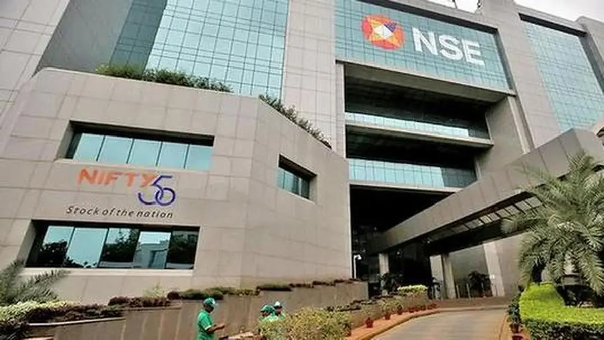 Nifty hovers near record high as banking stocks power rally