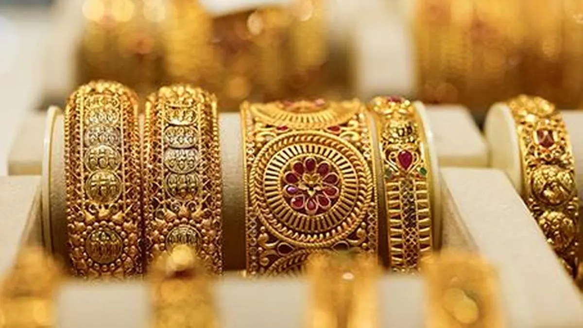 Gold edges down with US-Iran talks, central bank decisions in focus